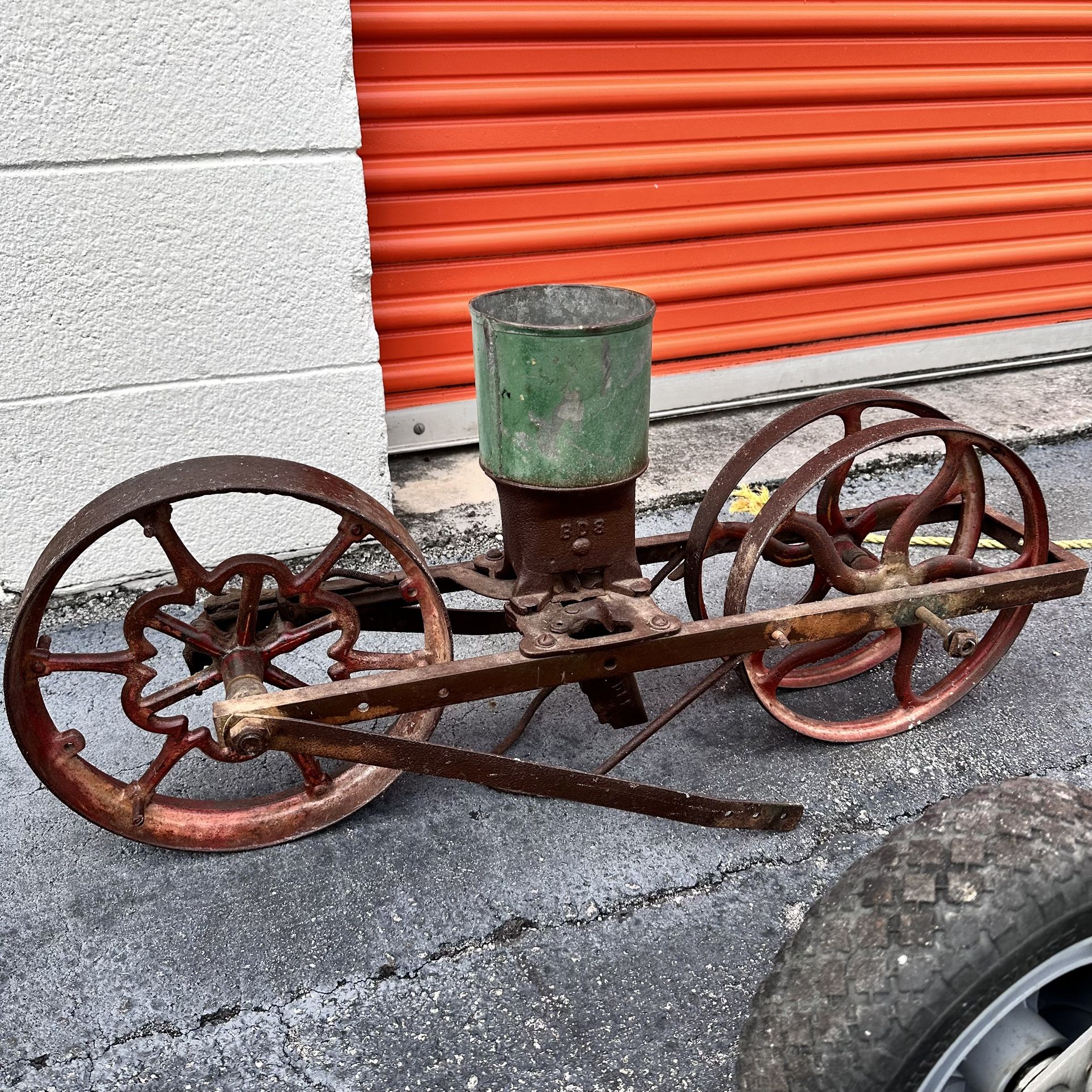 Farm Tool Seed Spreader On Wheels Antique Or vintage Cast Iron, Cute Patio Decor, Flower Planter
