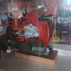 Turborcharger Cutaway In A Plastic Display Case 