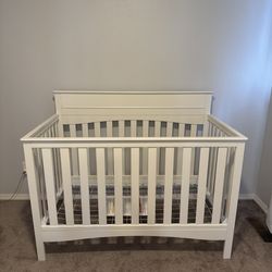 Delta convertible wood crib