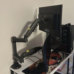 dual monitor setup with 2 LG 24BK550Y-I monitors plus a dual monitor arm mount.