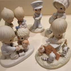 A wonderful set of five Precious Moments figurines for $50