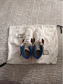 Size 14 Gucci high top sneaker. Wore few times good condition. Original bought for 650 new. Selling for 175.