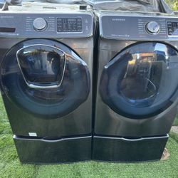 Samsung washer and electric dryer on pedestals! 