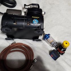 Iwata airbrush compressor and airbrush guns and many Accessories