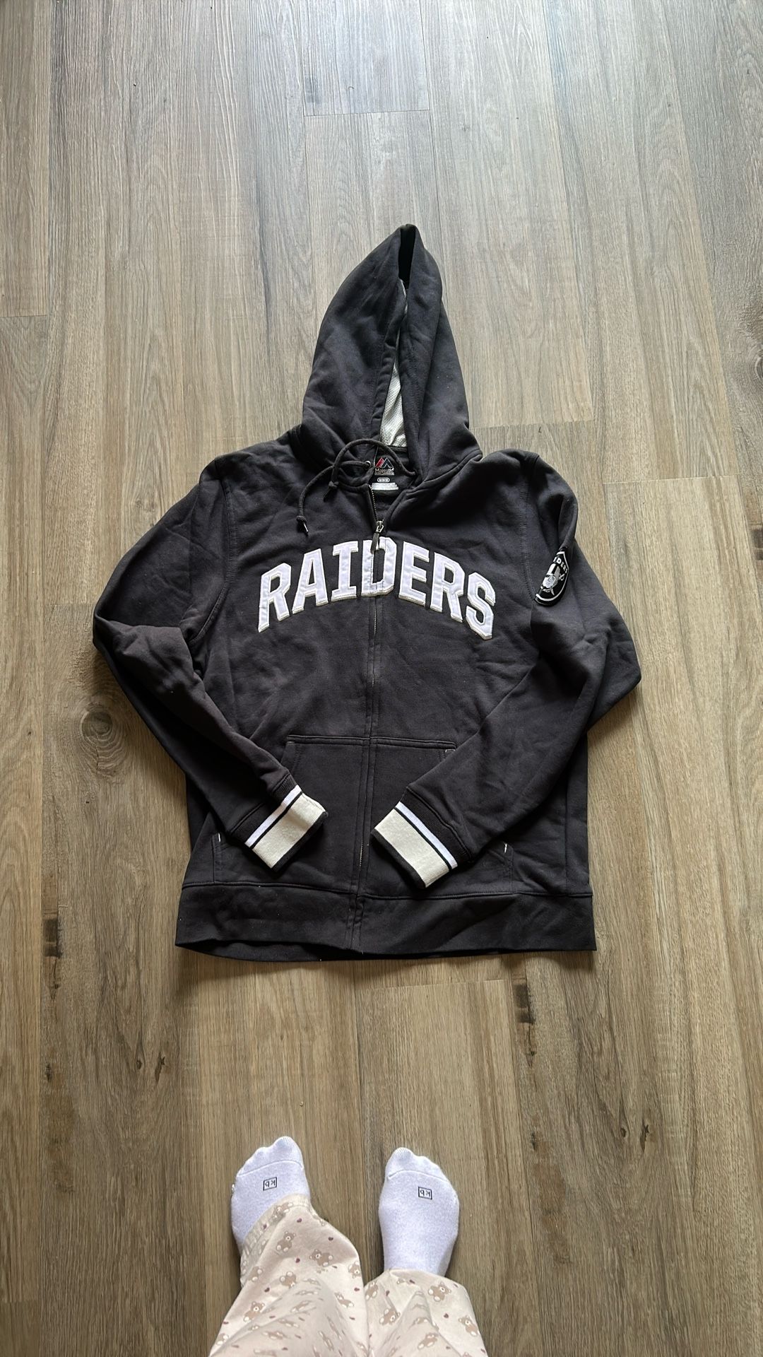 Zip up raider sweatshirt, size medium