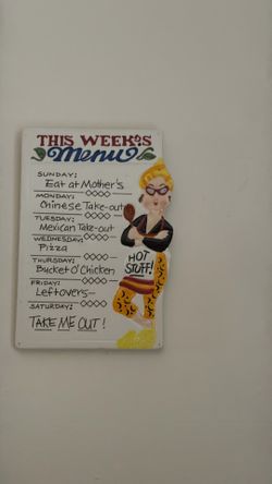 This is a Boston Warehouse ceramic "This Week's Menu" trivet featuring a "Hot Stuff" character.