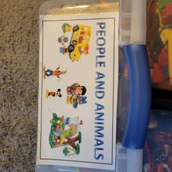 Full Bin Of Assorted People And Animals 