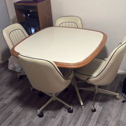 Dark Wood Table With 4 White Leather Chairs 