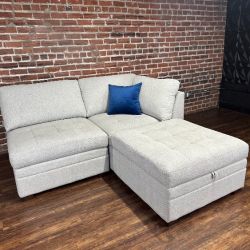 Delivery Available Thomasville light gray loveseat w storage ottoman