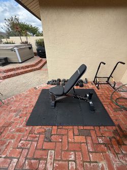 Weights, bench and tricep tower
