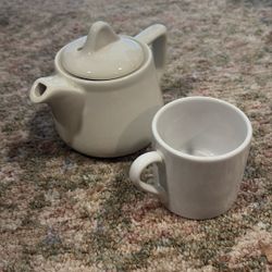 One Teapot And Cup