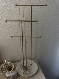 gold necklace and ring holder stand 