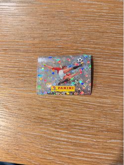 Original Panini sticker #00 available from the FIFA World Cup 2026 album.