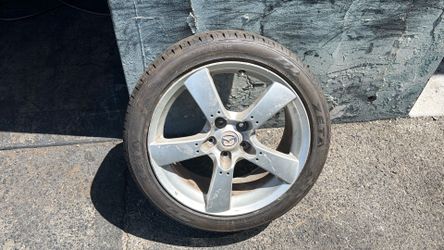 One 18 Inch Mazda Rx8 Aluminum Rim And Tire