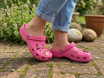 Pair of vibrant pink kids' Crocs Classic Clogs Sz 5 Jr