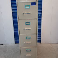 Solid metal file cabinet with key by Staples