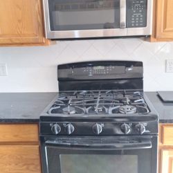 Gas Stove Black And Microwave Stainless Steel 30”