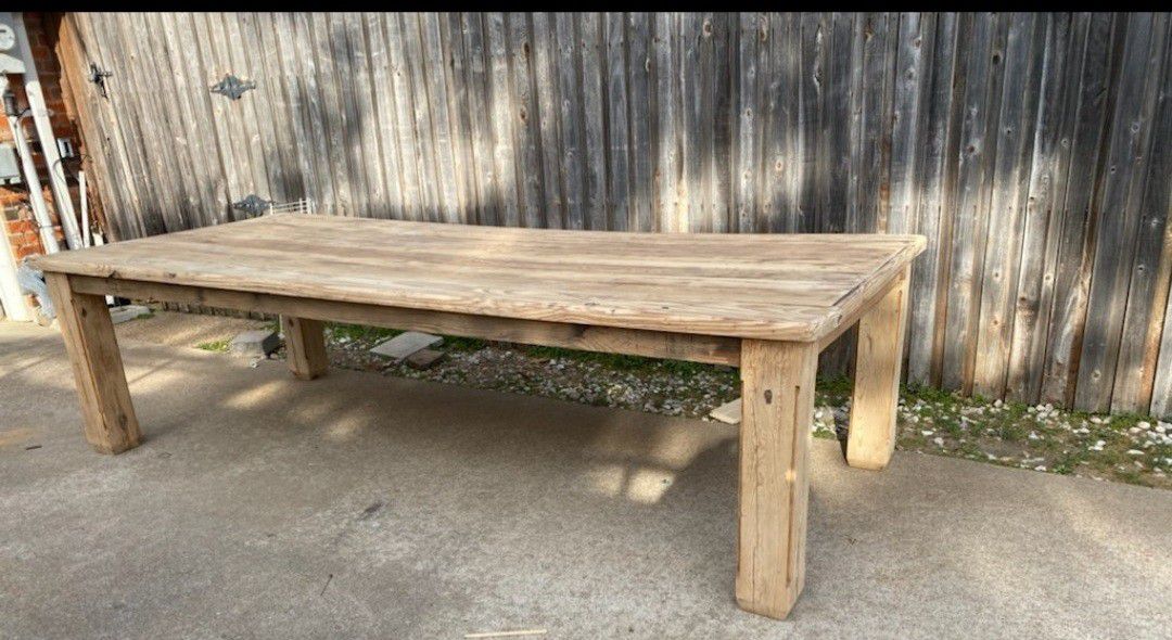 Solid hand crafted wood table with 4 chairs. Table now has grey legs. Very heavy must bring help with you to load. Perfect for the holidays.