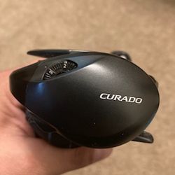 Shimano Curado MGL 70XG