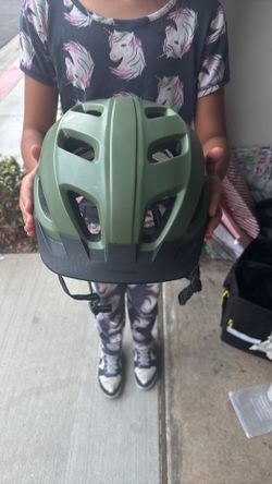 Green and black helmet