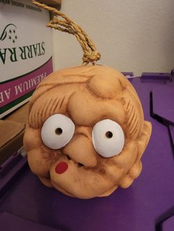 Goofy Face Clay Bell