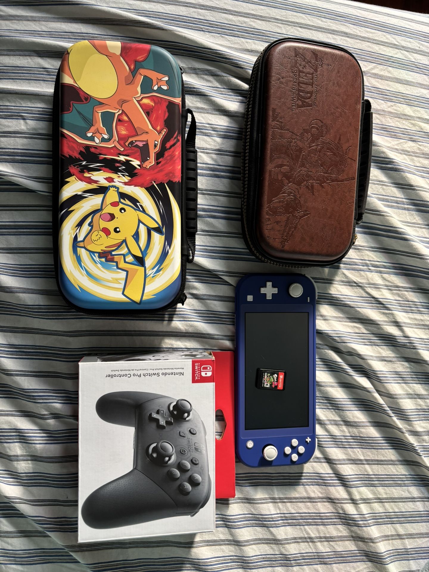 Nintendo Switch Lite With Splatoon 2, Pro Controller,and 2 Cases