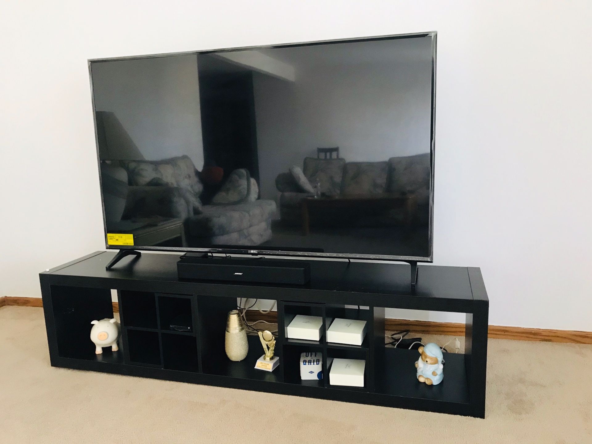65 inch LG 4K UHD TV with ikea TV table with light fixtures