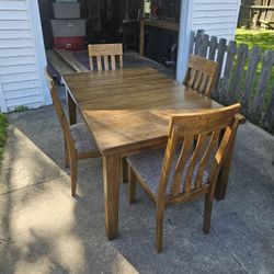 Dining Table And Four Chairs