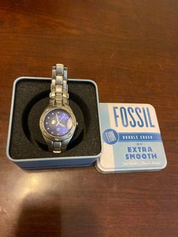 Fossil watch with tin