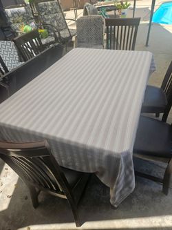 Dining room table and chairs.
