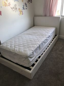 Twin bed (frame and mattress)