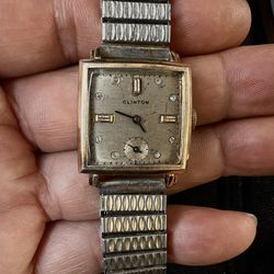 Vintage Clinton Swiss made mechanical men watch square size 27mm.