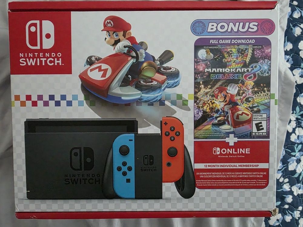 NINTENDO SWITCH WITH MARIO KART DELUXE
