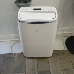 PRICE REDUCTION!!!    LG ThinQ Portable Air Conditioner With Dual Inverter And Wi-Fi Connectivity Practically New