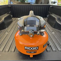 RIDGID 6 Gal. 150 PSI Portable Electric Oil-Free Jobsite Pancake Air Compressor with Dual Pressure Gauges and 2-Quick Couplers