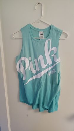 Pink sleeve less tank top size small runs big . Small stain as shown in pic