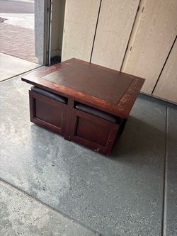 Coffee table with seats and storage