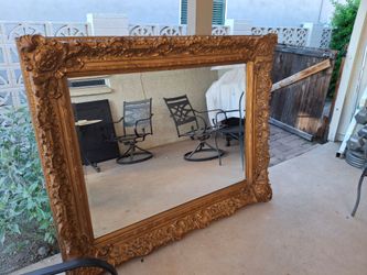 Large ornate gold mirror
