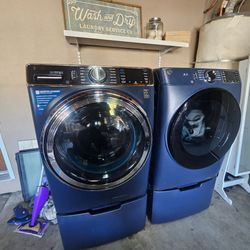 GE profile washer and dryer  with stands 2 years old