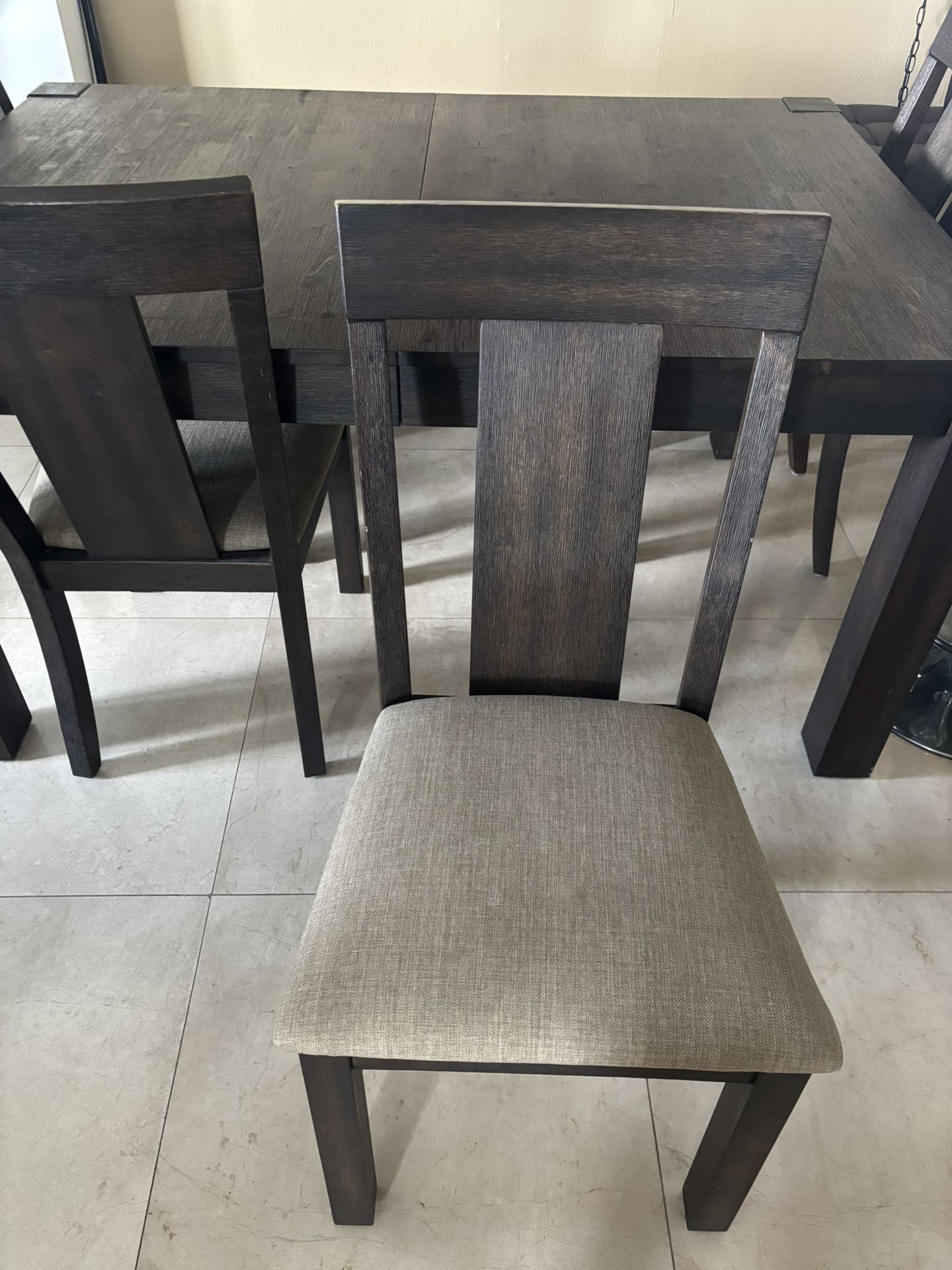 Large Dining Table with a Bench and Four Chair