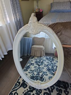 Beige mirror, hanging