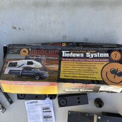 O2-09 HAPPIJAC TRUCK CAMPER TIEDOWN SYSTEM