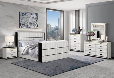 Luxurious, fabric upholstered TV lift bed features crystal insert fireplace, speakers & more