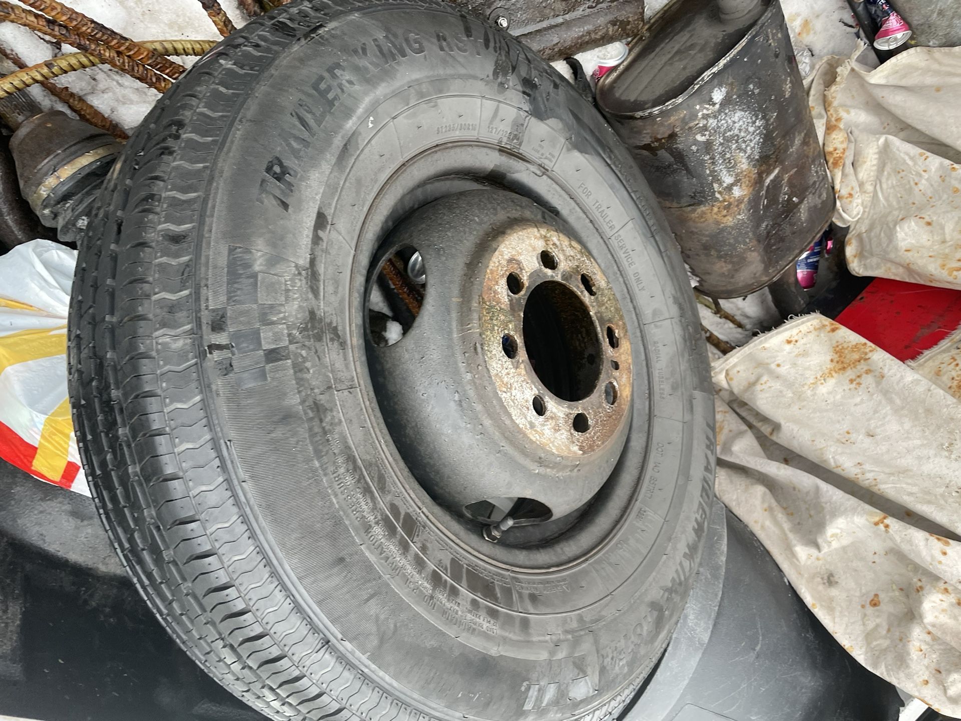 3 Different Tires Lying On My garage