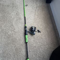 6ft One bass 2 piece fishing rod with a Daiwa Regal LT reel