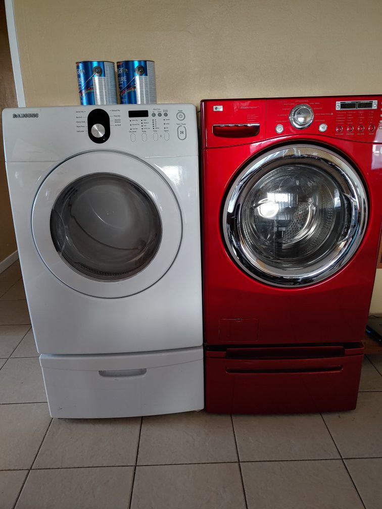 LG red washer with steam and. Samsung electric dryer together $350 washer $250 dryer $150