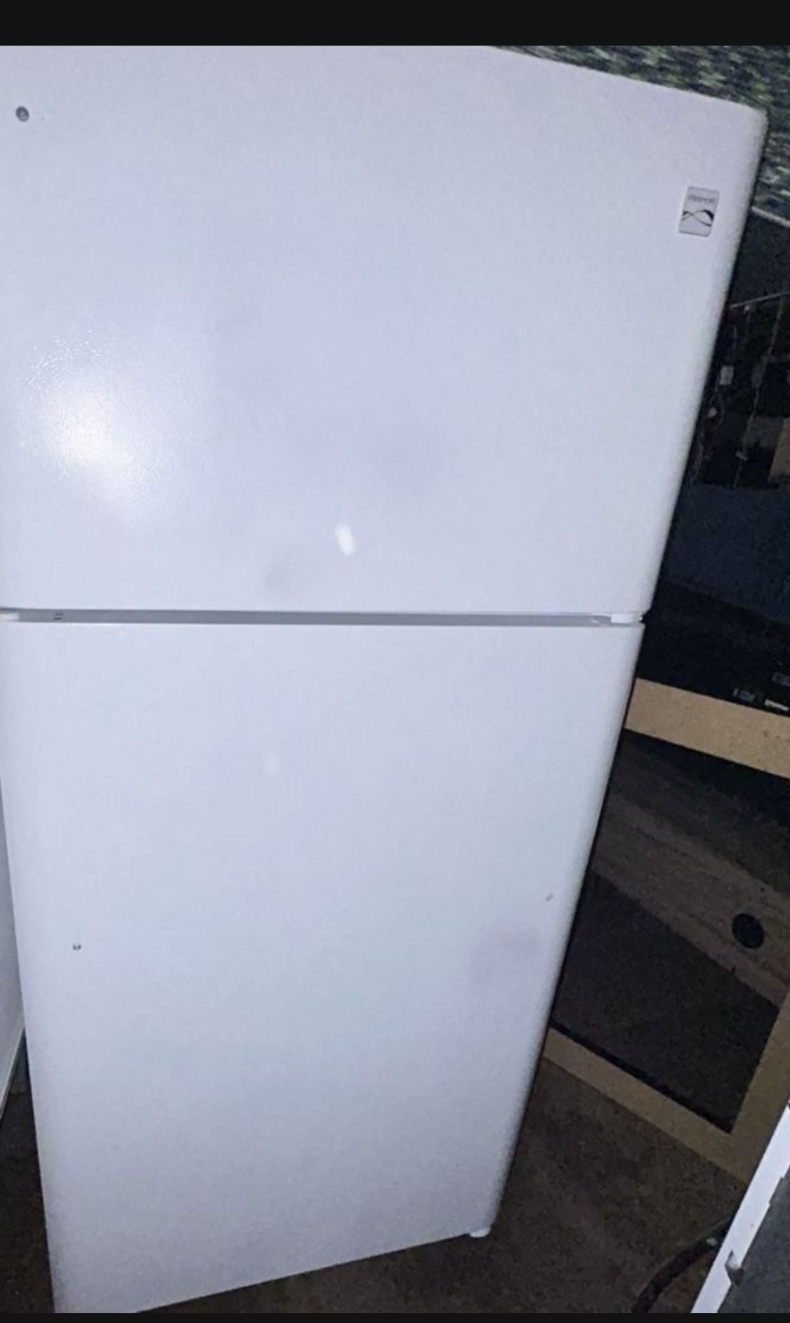 Free refrigerator, turns on but doesn't cool.