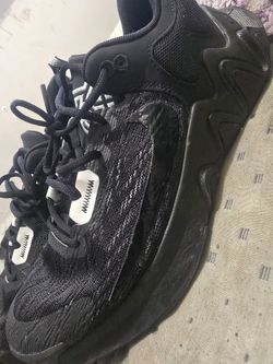 Nike Giannis Immortality 2
Black Holographic Swoosh