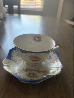 Antique tea cup and plate set