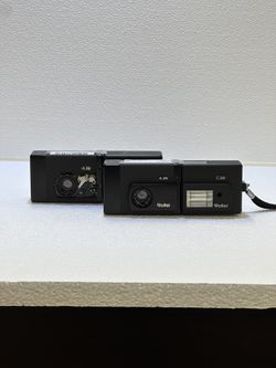 Pair Of Rollei A26 Film Cameras With C26 Flash